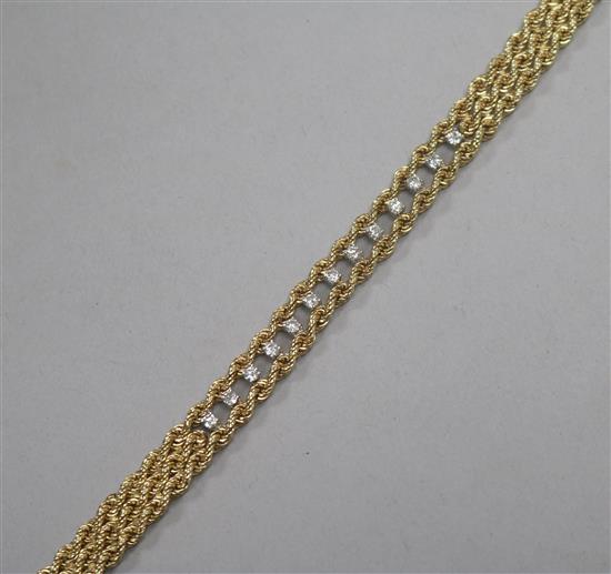 A modern 14ct gold, and diamond set multi ropetwist and openwork bracelet, 18.5cm.
